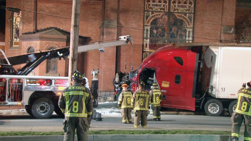 Two injured, church damaged in Connellsville following crash Herald